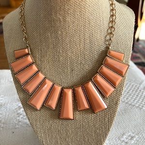 Statement necklace. Style snd color say vintage, lobster clasp says maybe not